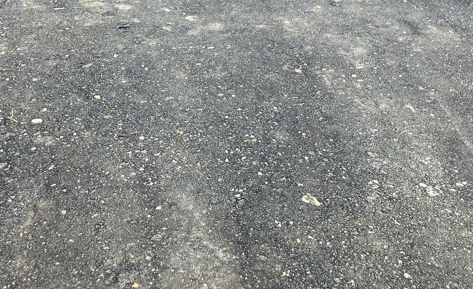Close view of compacted aggregate surface material